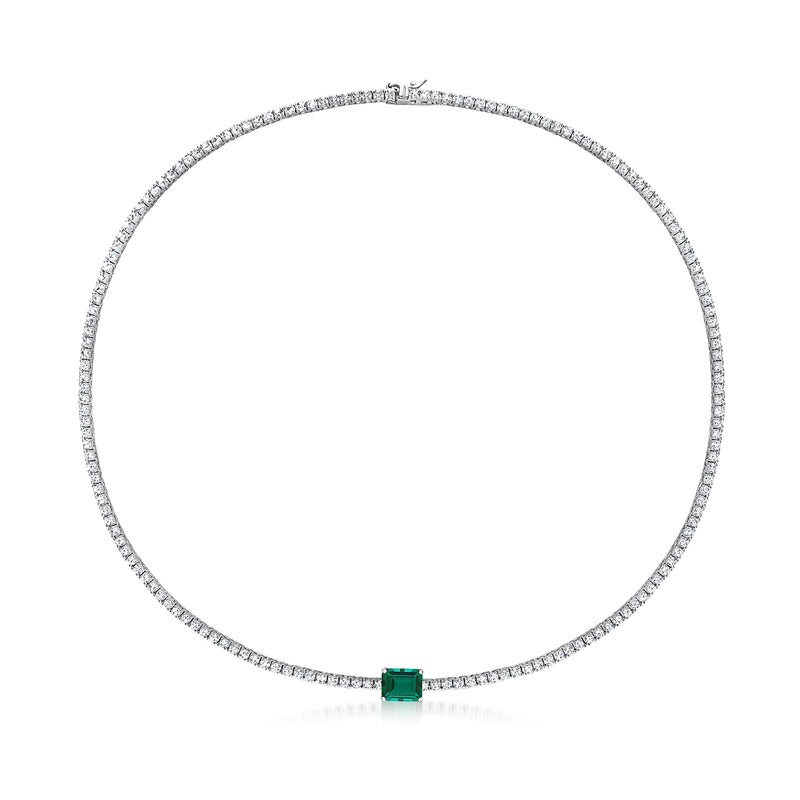 Sterling silver tennis necklace with white round stones and small green square simulated gem clasp