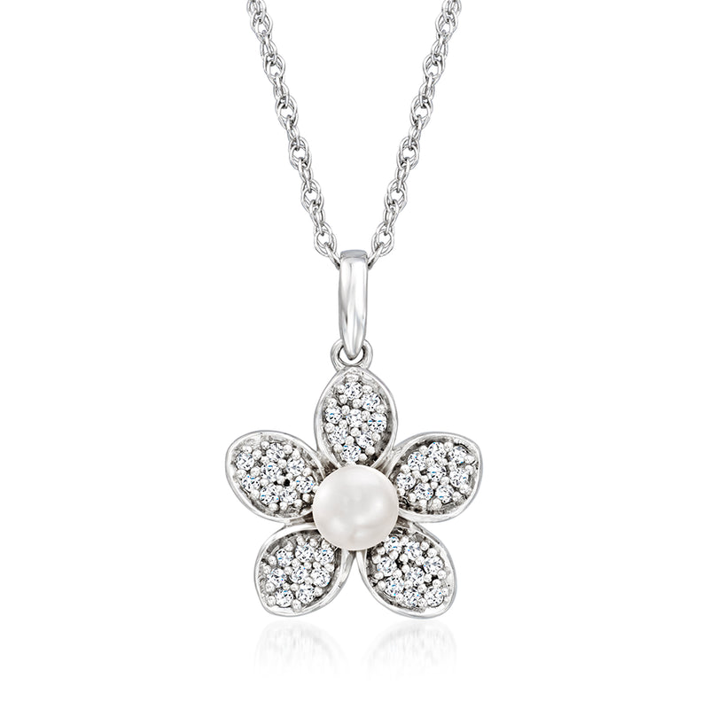 Sterling silver flower pendant necklace with pearl center and diamond petals