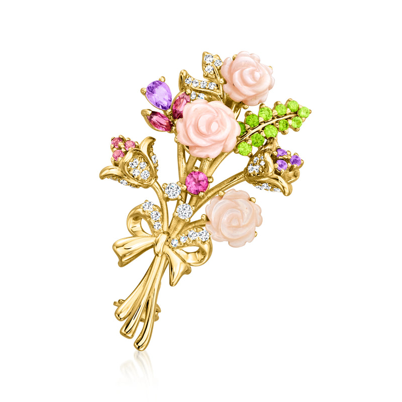 Gold floral bouquet pendant with pink roses, purple teardrop gems, and green leaf accents.