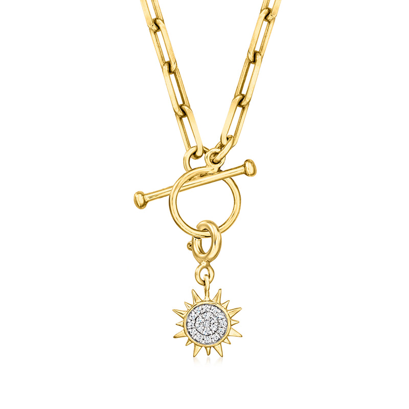 Gold sun charm pendant with round diamond halo and spiked rays on bail