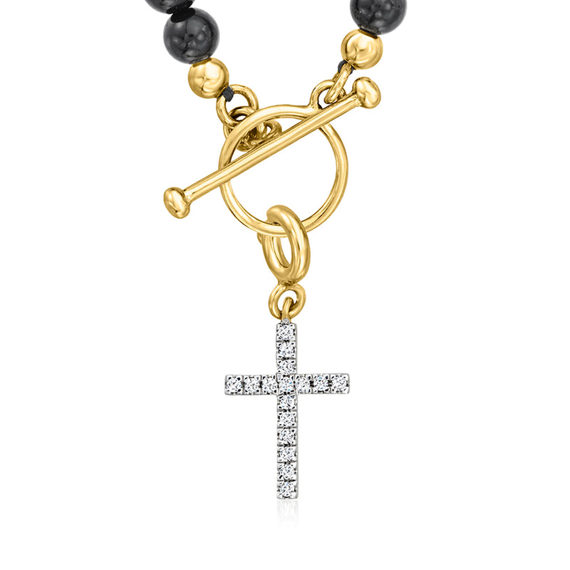 Diamond cross charm in 18kt gold over sterling with toggle clasp