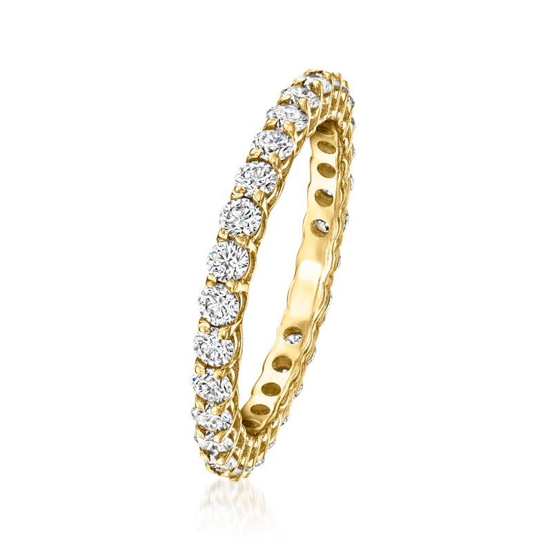 Yellow gold eternity band with round diamonds along the curved side
