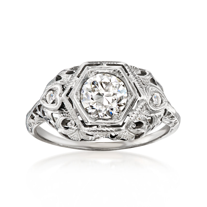 Vintage diamond filigree ring in 18kt white gold with round center stone