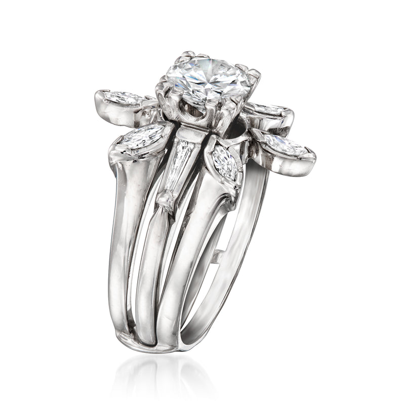 Diamond engagement-style ring with large round center stone and side marquise diamonds