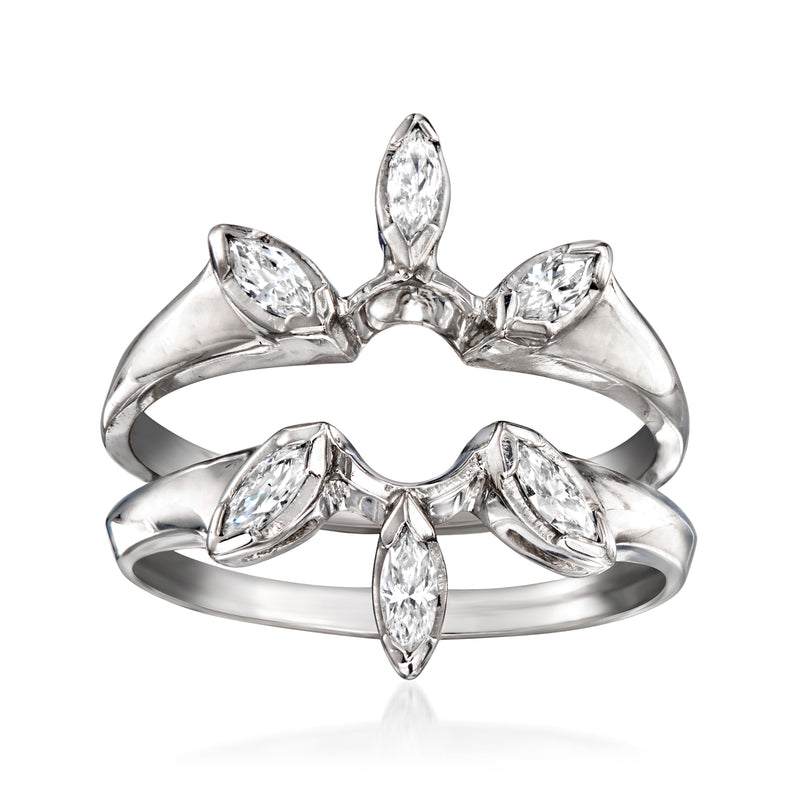 Diamond ring with pear-shaped center stone and marquise side stones on white metal band