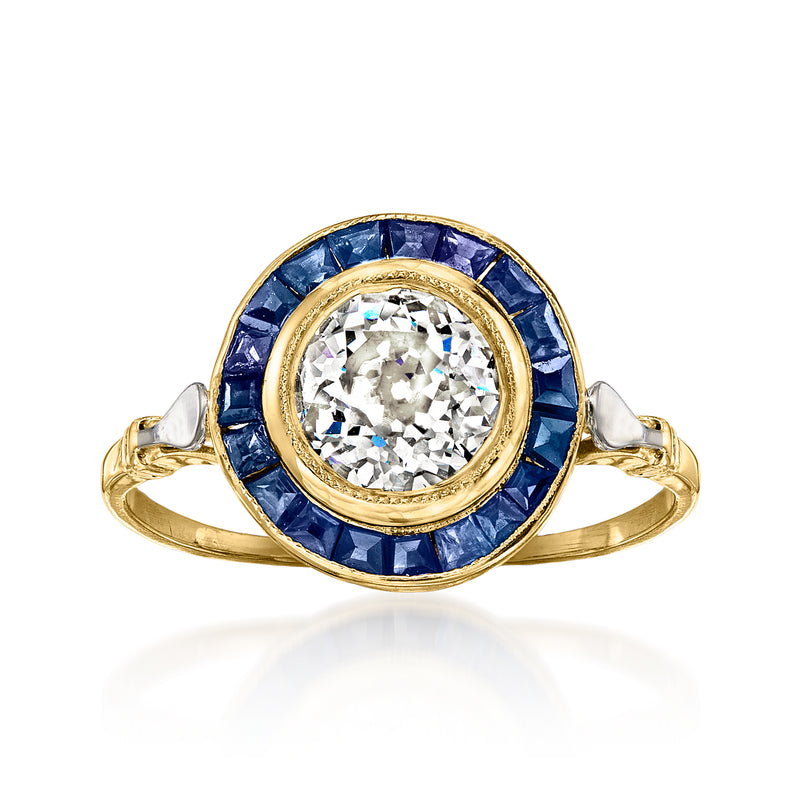 Vintage 18kt yellow gold ring with round diamond center and sapphire halo