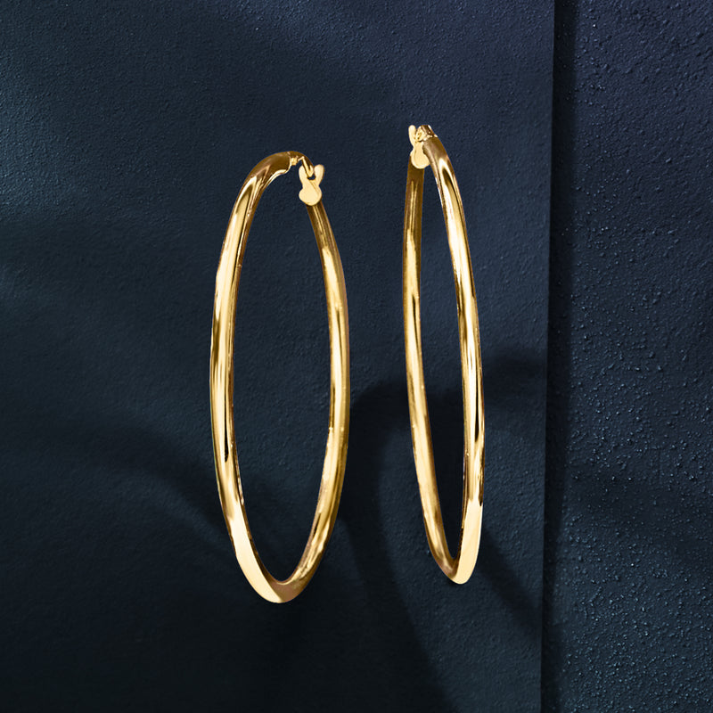 Yellow gold hoop earrings, slim oval hoops with hinge clasp