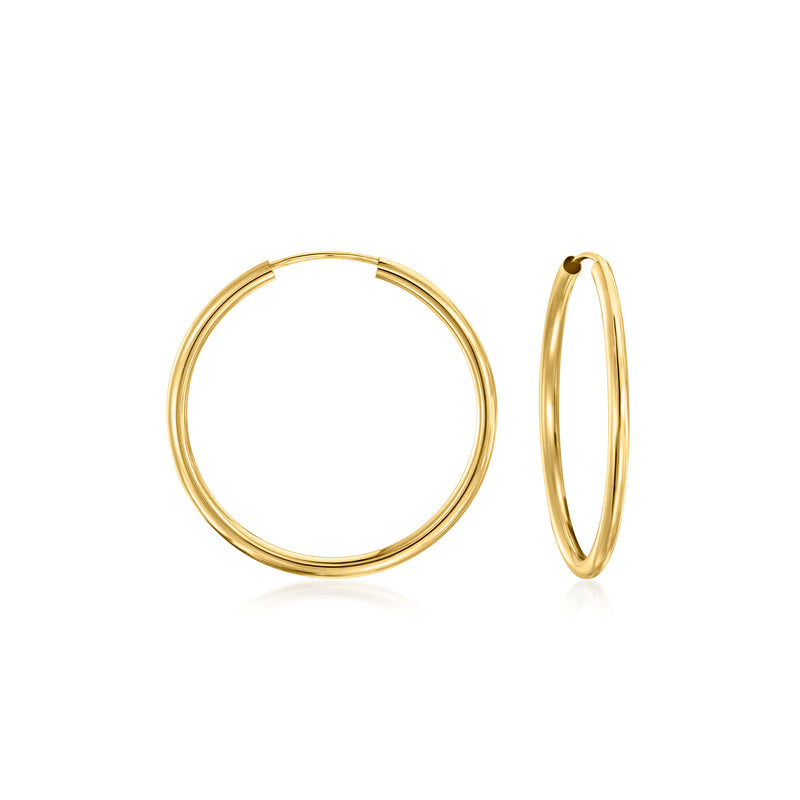 14kt yellow gold endless hoop earrings, round smooth hoops.