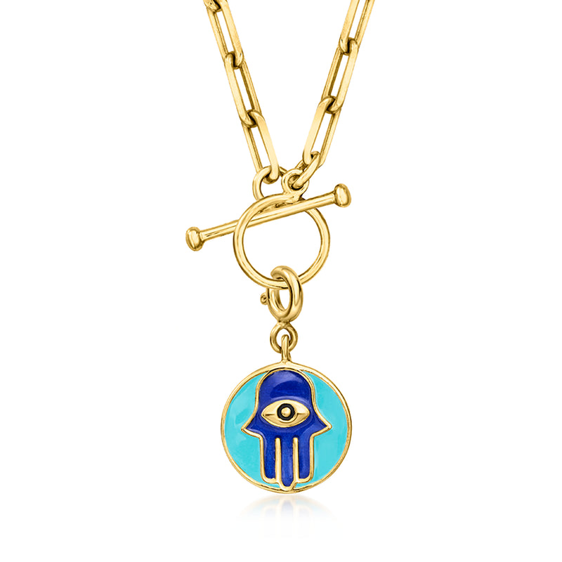 Gold hamsa charm pendant with blue enamel disc on layered chain with clasp bar