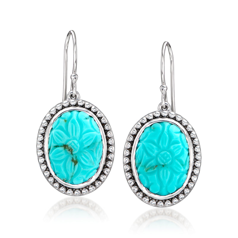 Sterling silver drop earrings with turquoise carved floral oval and pave border