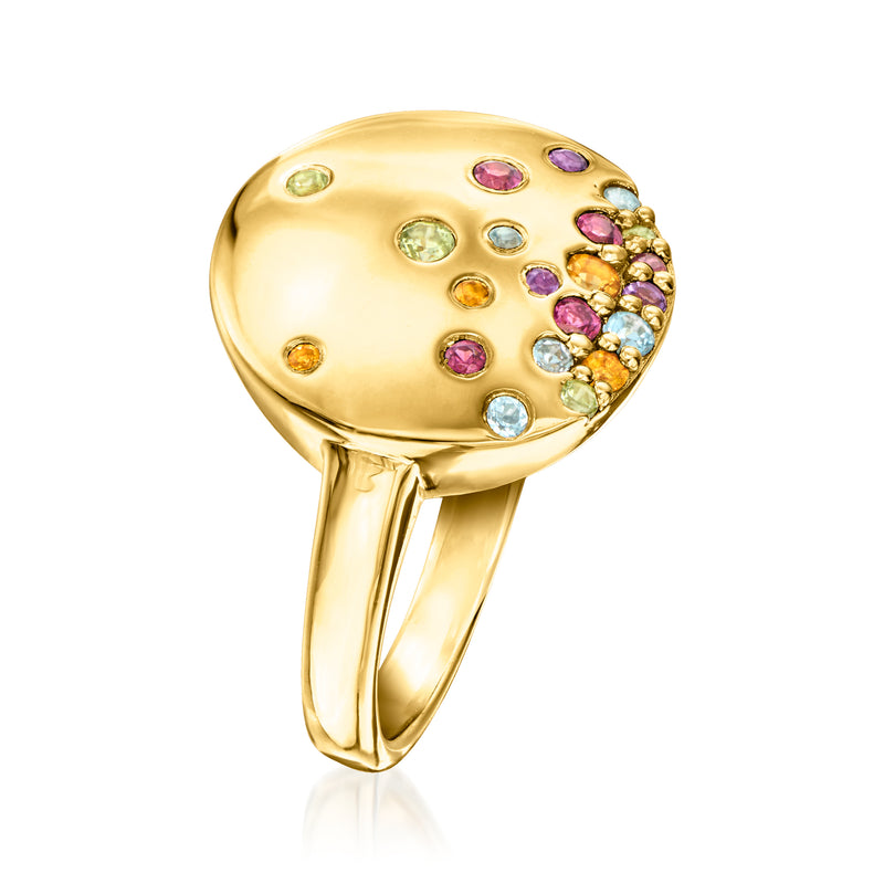 Gold disc ring with multicolor gemstones, side view of domed face and band