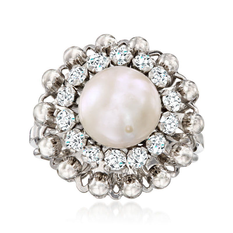 Cultured pearl and diamond cluster ring in 18kt white gold, halo of round stones