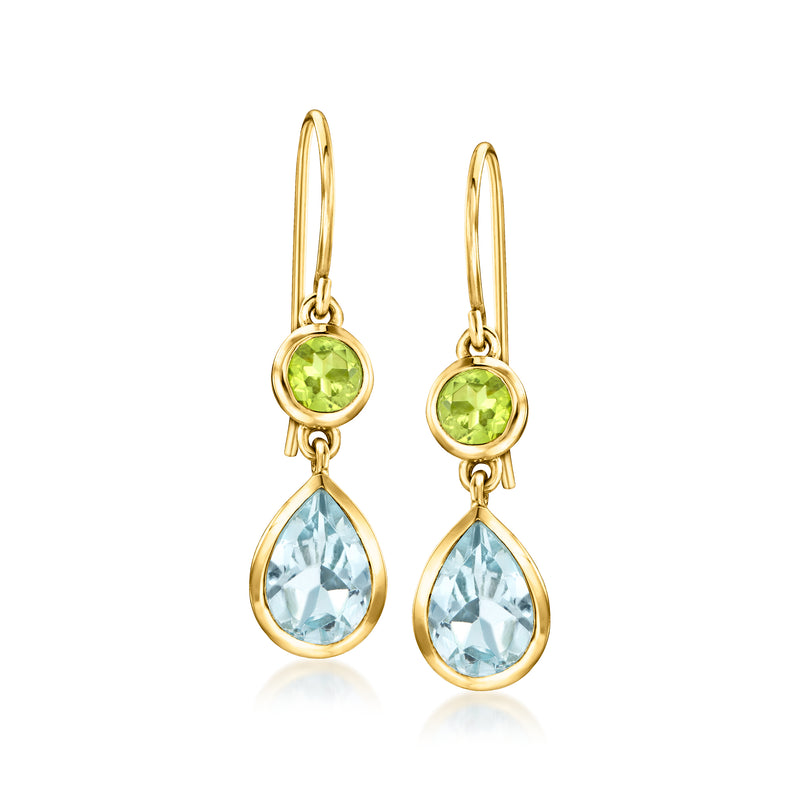 Gold-tone drop earrings with green peridot and teardrop light blue topaz