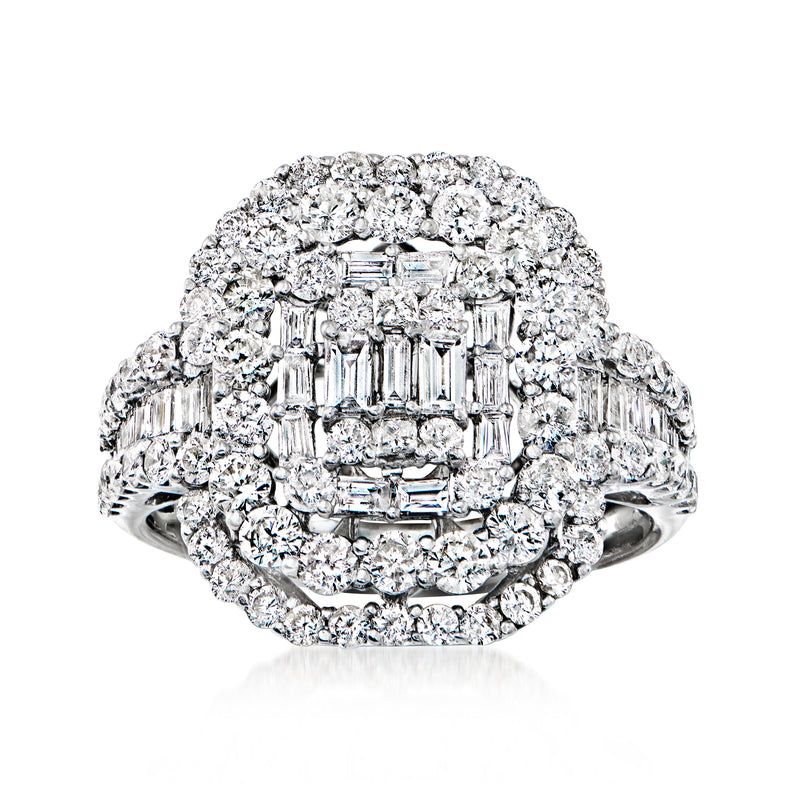 18kt white gold diamond cluster ring with baguette and round stones, center emerald-cut