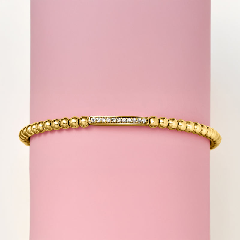 Gold bead stretch bracelet with rectangular diamond bar detail