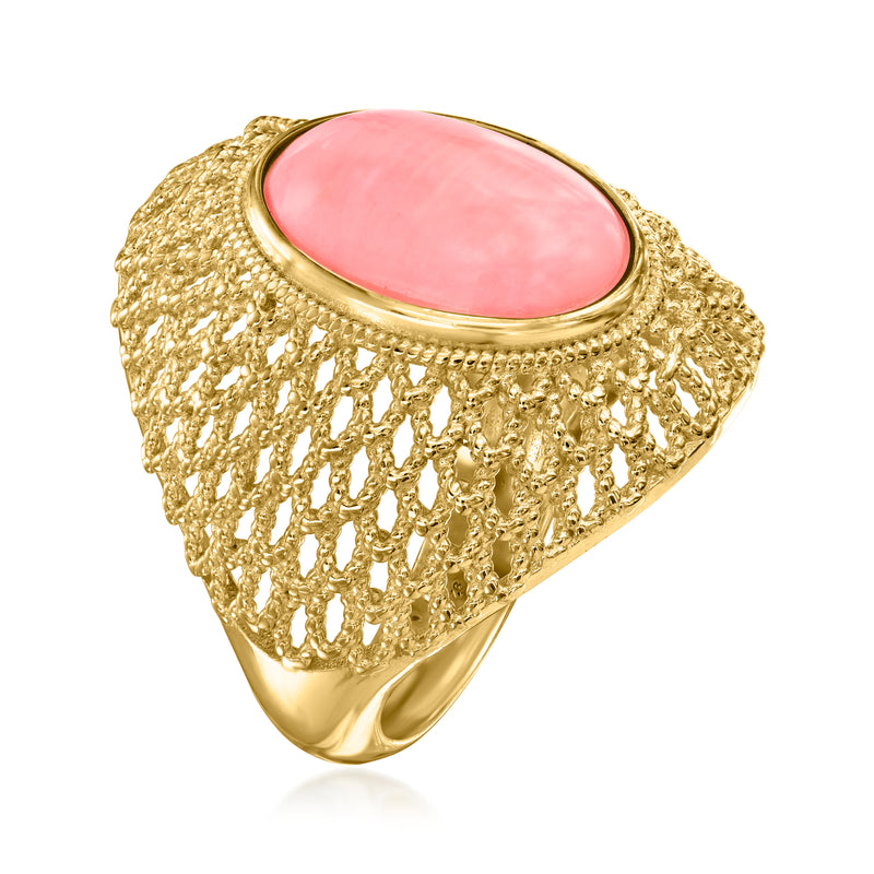 Pink dome oval stone set in gold bezel on openwork textured gold ring