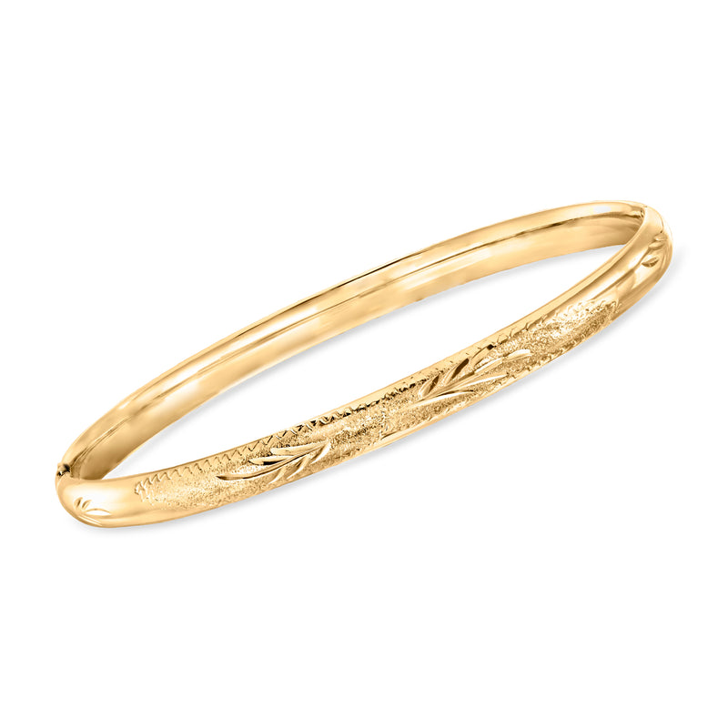 Yellow gold etched bangle bracelet with braided pattern