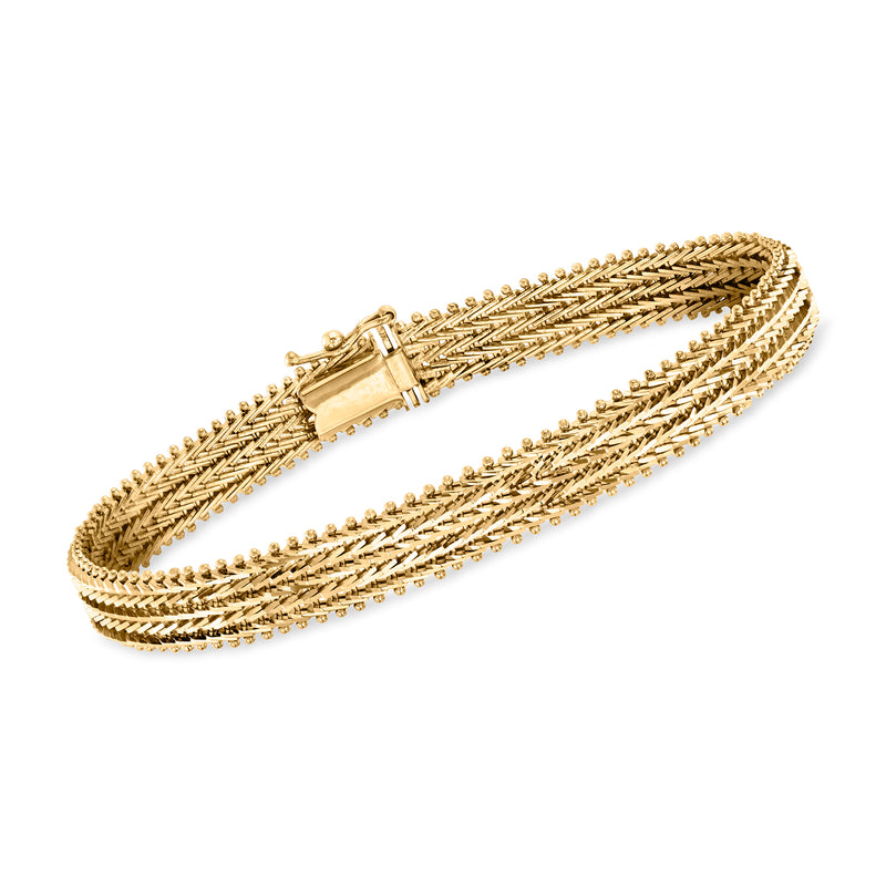 Vintage 14kt yellow gold link bracelet with layered chain and box clasp, gold-toned.