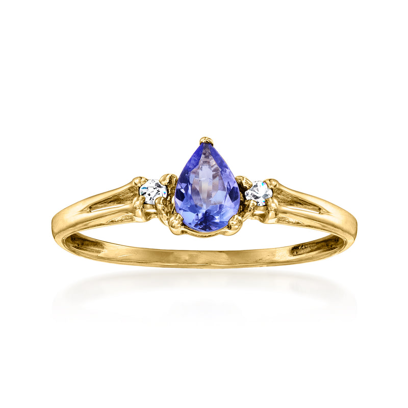 Vintage tanzanite ring in 14kt yellow gold with pear-cut blue-violet center and diamond accents