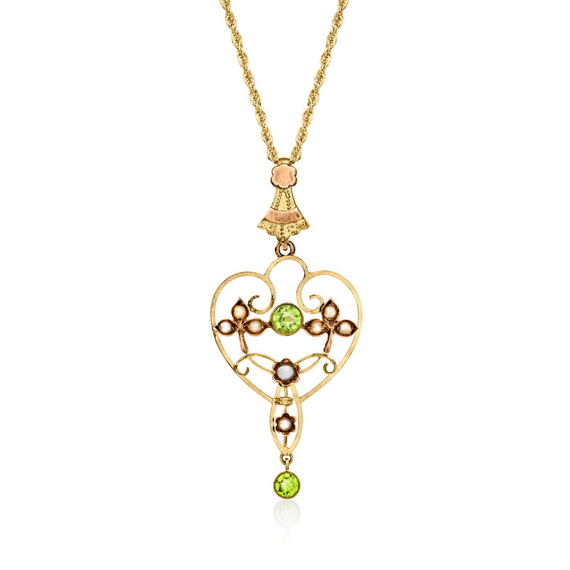 Heart pendant necklace in 9kt yellow gold with green peridot and scrollwork detail