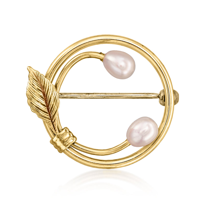 Yellow gold circle pin with leaf detail and two white cultured pearls