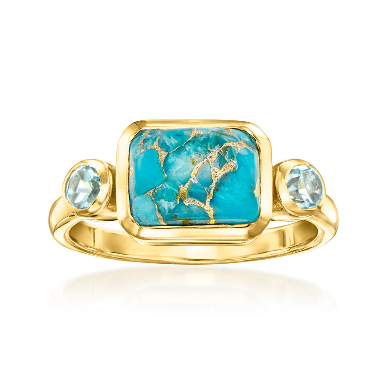 Gold-tone ring with rectangular turquoise blue gemstone center and two round blue accents