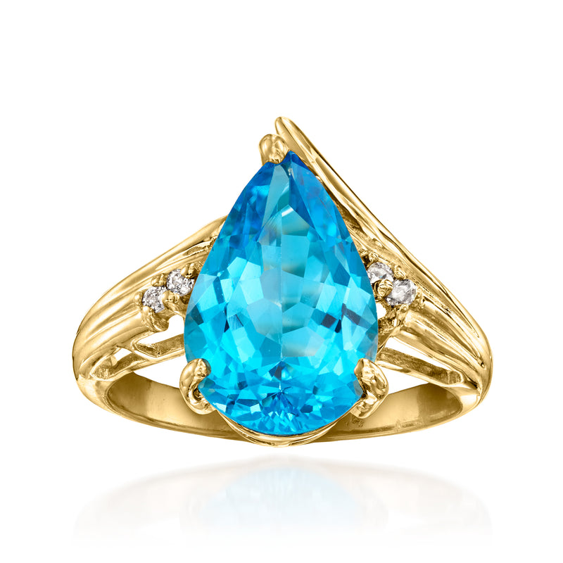 Vintage 14kt yellow gold ring with large blue topaz and diamond accents
