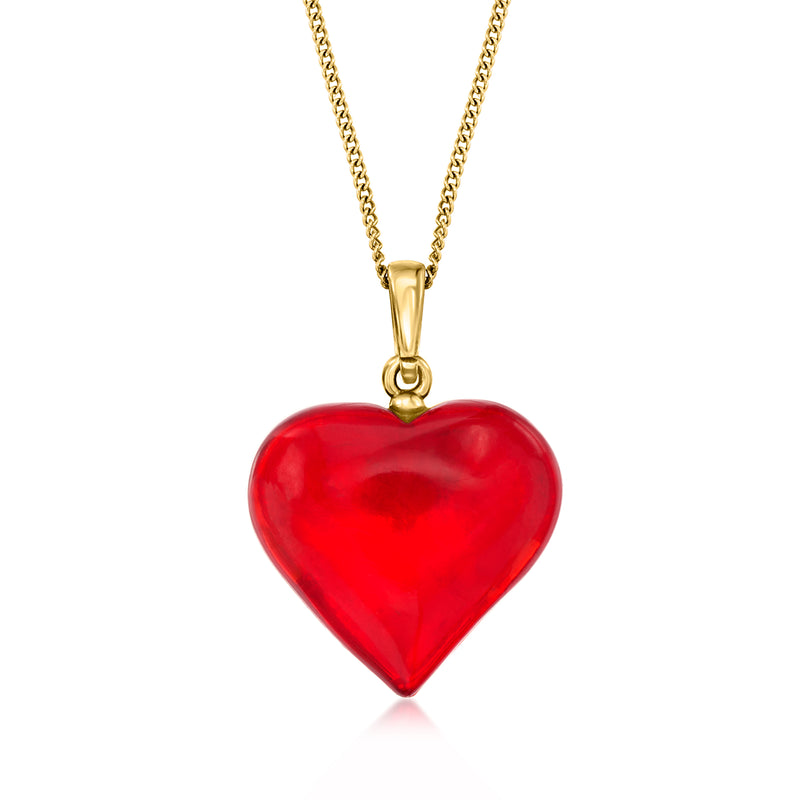 Heart-shaped red amber pendant necklace with gold-tone chain and loop clasp