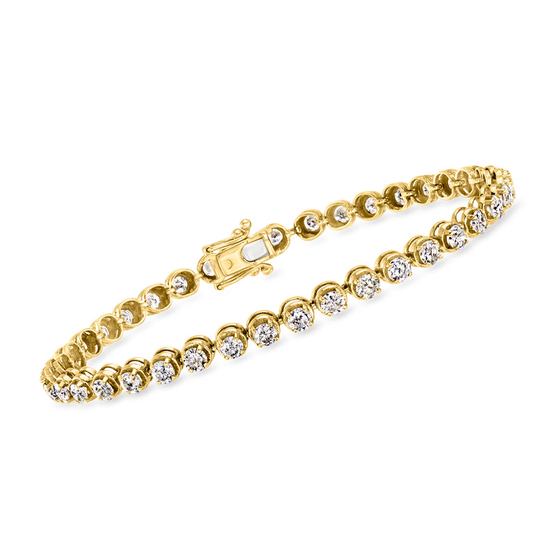 Vintage diamond tennis bracelet in 14kt yellow gold with round stones and box clasp