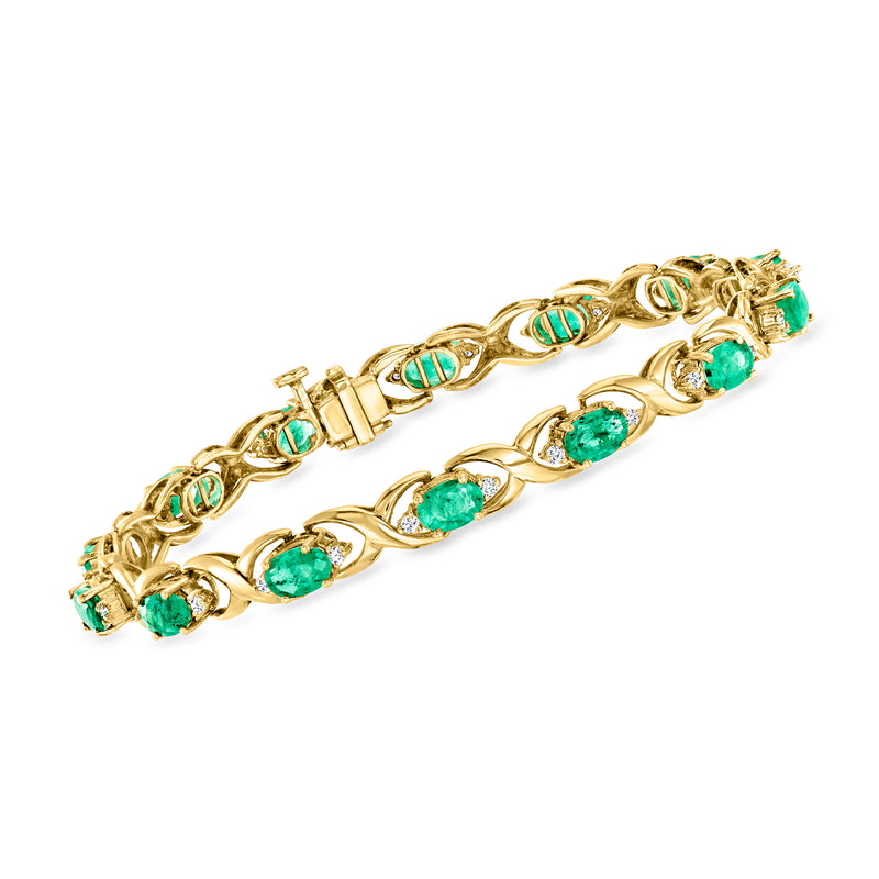 Vintage 14k yellow gold link bracelet with emerald-colored gemstones and diamond accents