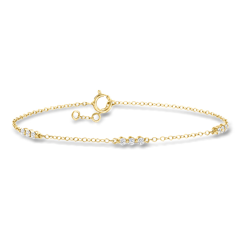 14kt yellow gold diamond trio station bracelet with three round stones on chain