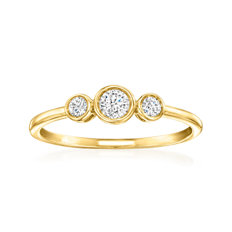 Yellow gold three-stone bezel-set diamond ring with round center and side stones