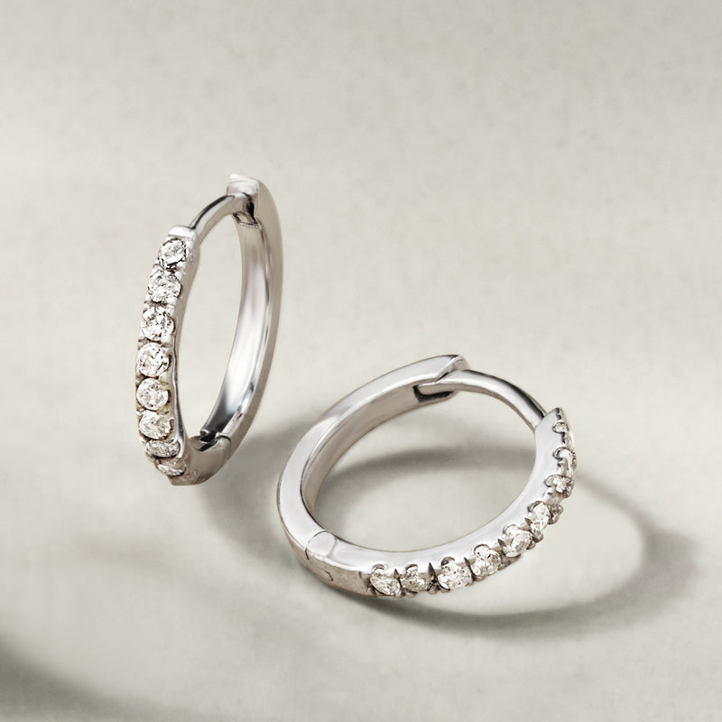 Diamond huggie hoop earrings in sterling silver