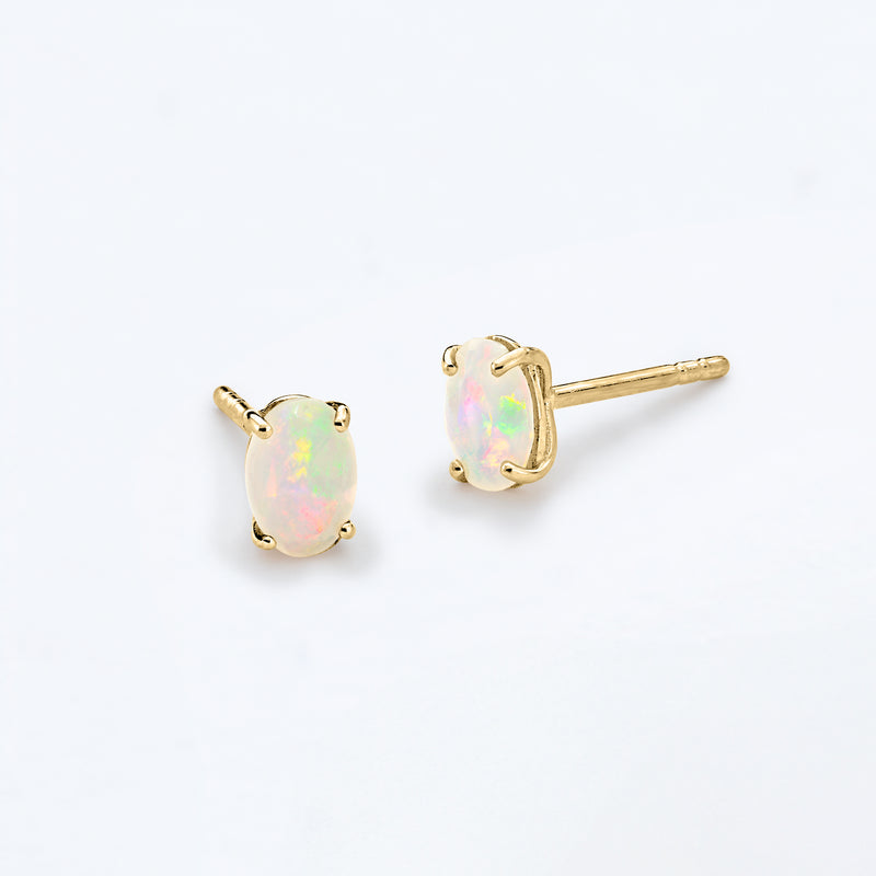 14kt yellow gold oval opal stud earrings, side view with post back