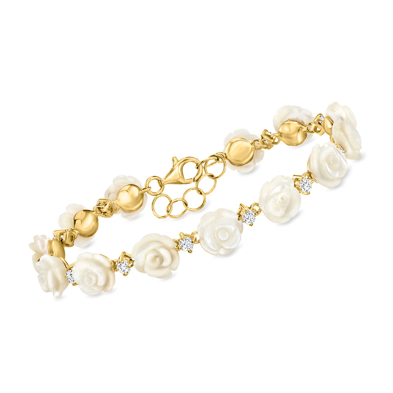 Gold bracelet with mother-of-pearl rose beads and small crystal accents