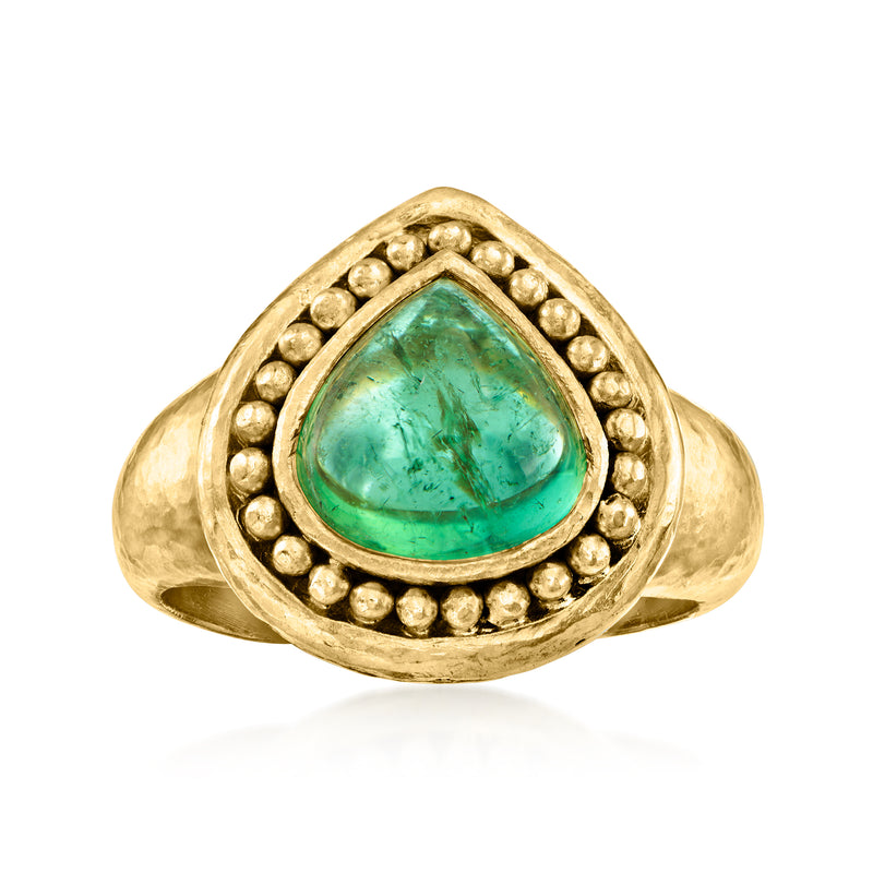 Oval green tourmaline cabochon ring in 19kt yellow gold with beaded halo
