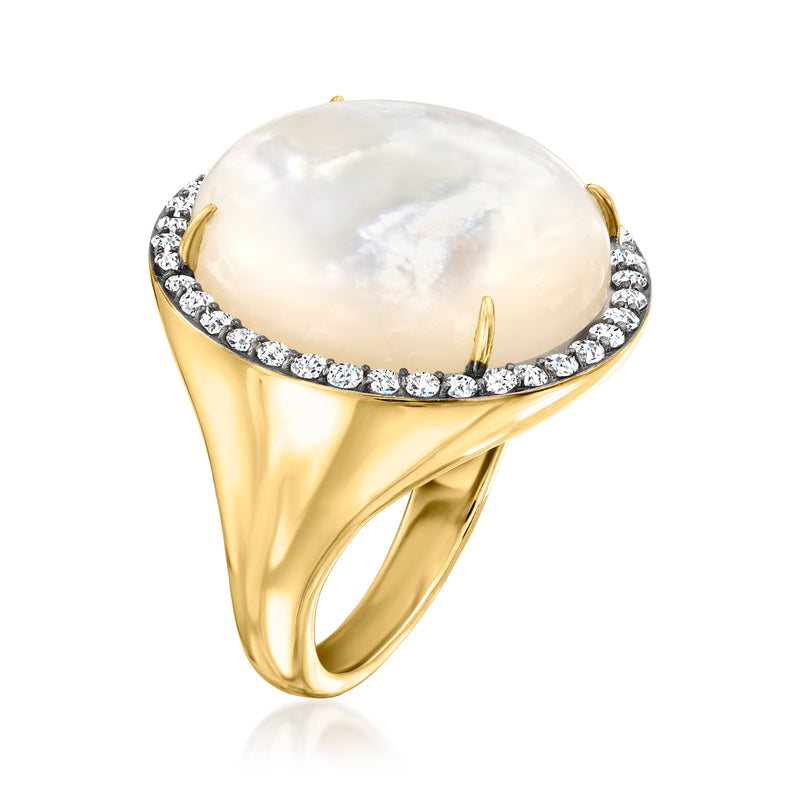 Mother-of-pearl ring with white topaz halo in gold over sterling