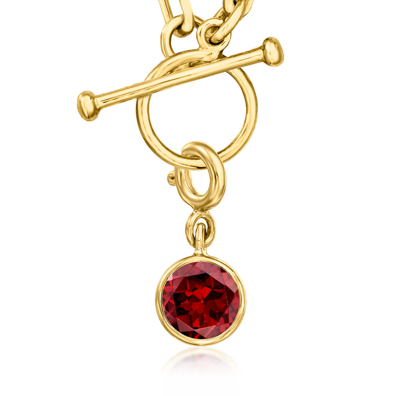 Gold-tone round birthstone charm with red faceted stone pendant