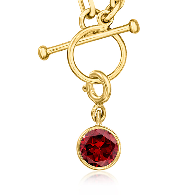 Gold-tone round birthstone charm with ruby-red faceted stone on bail