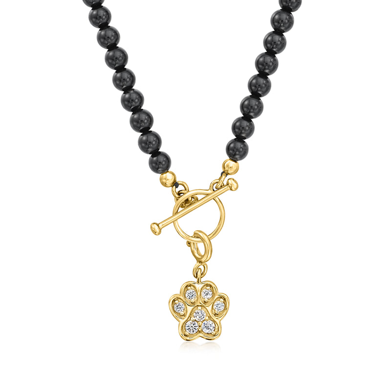 Paw print charm pendant on gold clasp with black bead necklace
