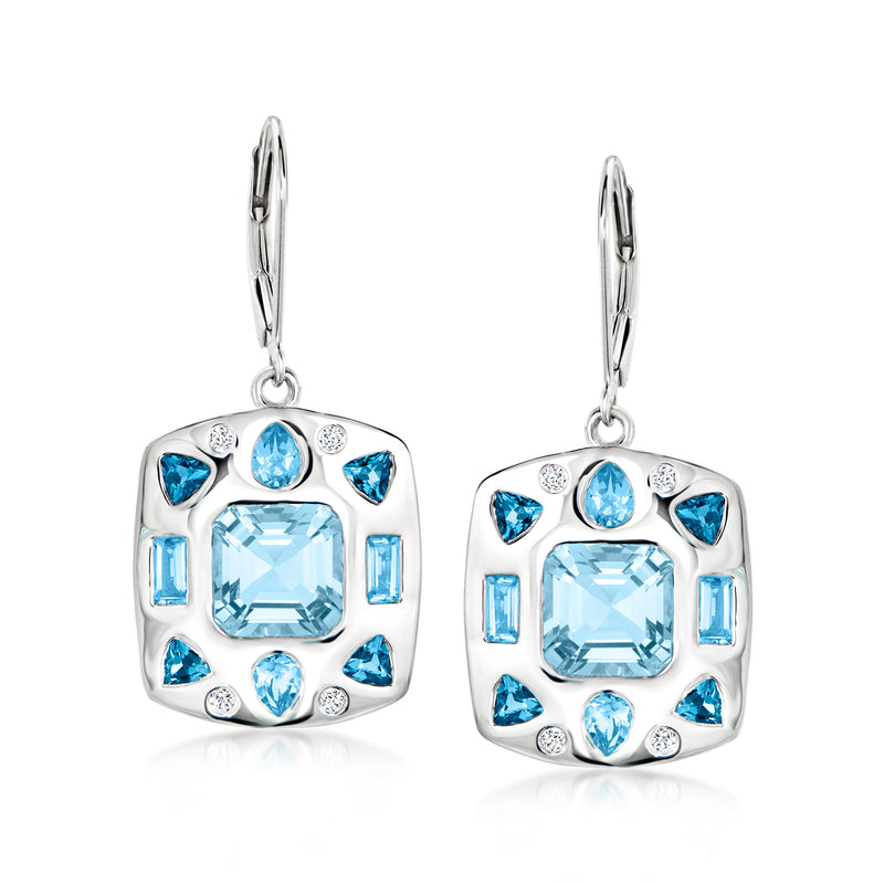 Sterling silver drop earrings with blue gemstones and small clear accents