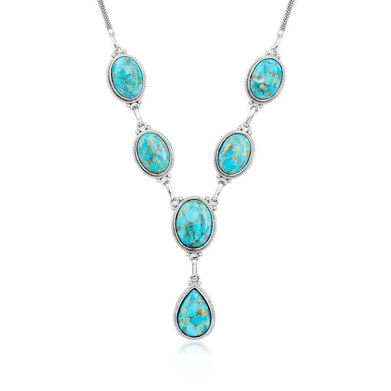 Turquoise cabochon Y-necklace in sterling silver with five oval pendants.