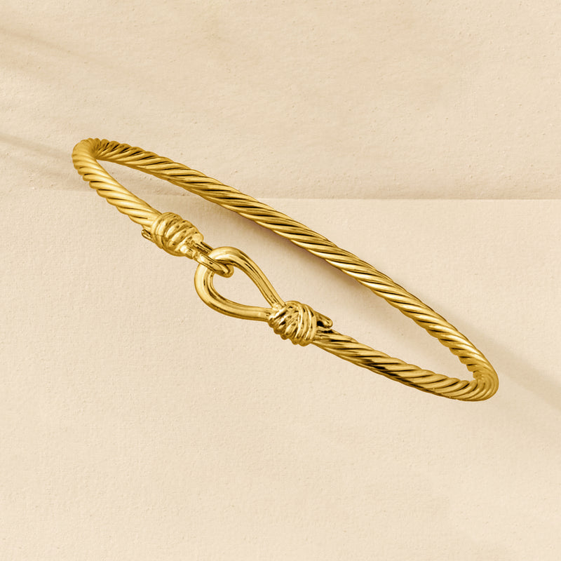 Gold over sterling bangle bracelet with twisted rope links and hook clasp detail