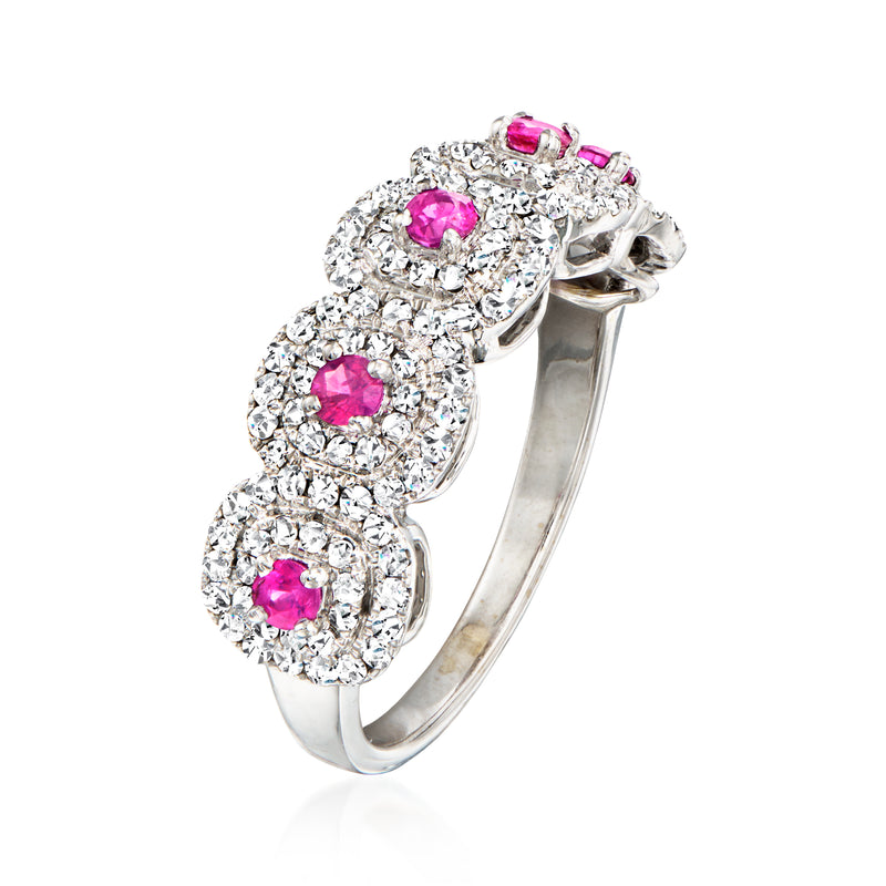 Diamond halo cluster ring with five pink rubies in 18kt white gold band