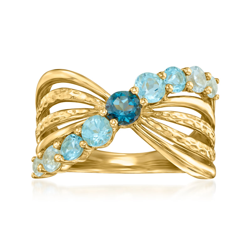 18kt gold over sterling bow ring with blue topaz stones