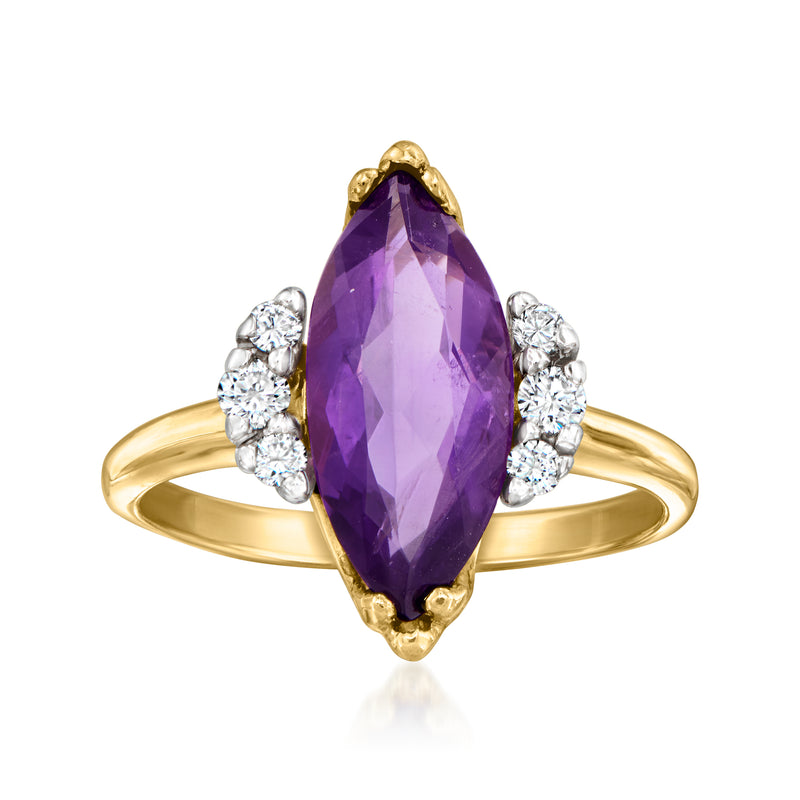 14kt yellow gold amethyst oval ring with round diamond clusters on each side