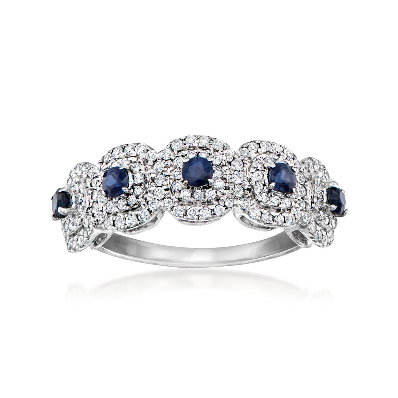 18kt white gold diamond cluster ring with round blue sapphire accents