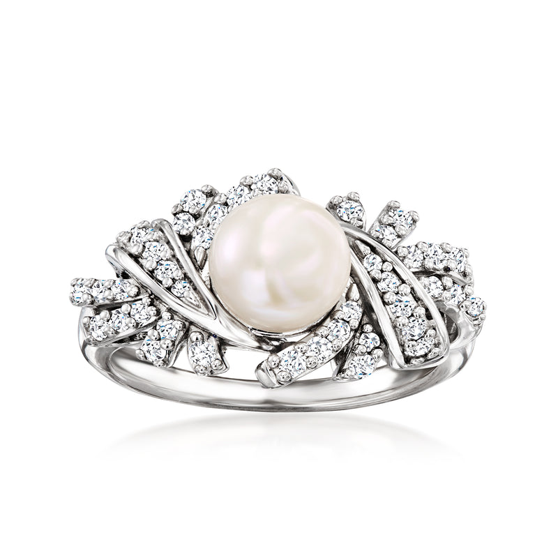 Sterling silver ring with round white cultured pearl and prong-set diamond accents