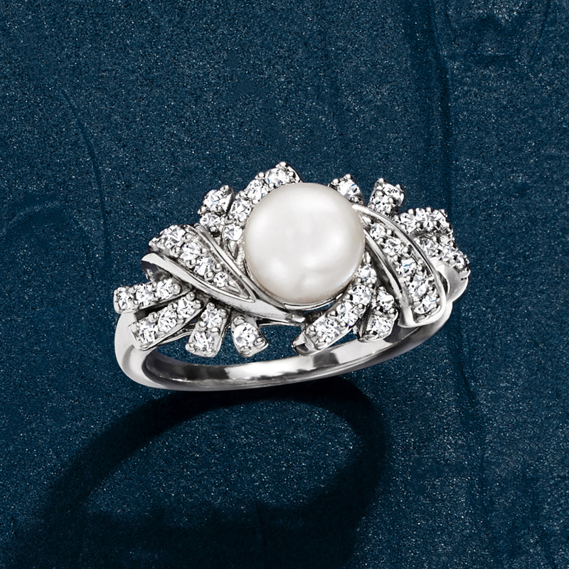 Sterling silver ring with round white pearl center and diamond cluster swirl