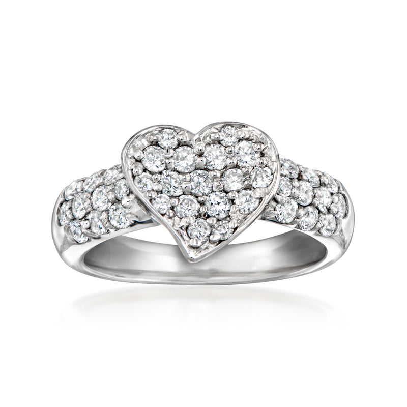 Platinum vintage diamond heart ring with clustered stones across the heart and band